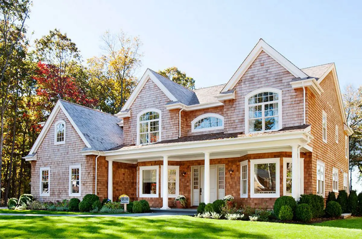 A large brick house with a lot of windows.